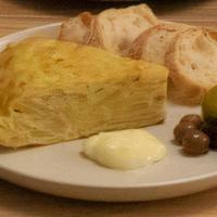 Tortilla Española · Traditional Spanish omelet of organic eggs, confit potatoes and Spanish onions.