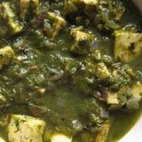 Shaag Paneer · Spinach cooked with cottage cheese, cream & spices. Served with Basmati rice.