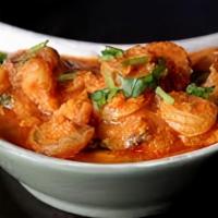 Shrimp Tikka Masala · Shrimp cooked with creamy tomato sauce flavored with dry fenugreek & butter masala. Served w...