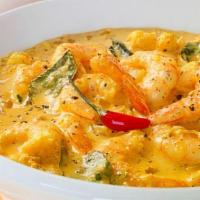 Shrimp Malai Curry · Shrimp cooked with coconut milk, mustard seeds, curry leaves & spices. Served with basmati r...