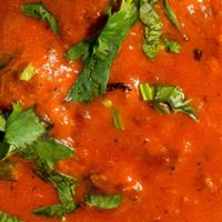 Goat Tikka Masala · Bone-in Goat meat cooked with creamy tomato sauce flavored with dry fenugreek & butter masala.