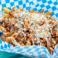 Vaquero Fries · Full order of seasoned stealth fries, topped with our own chorizo, queso fresco, sour cream,...