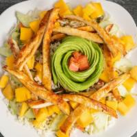 Avocado Mango Salad · Your choice of protein over a bed of lettuce topped with our mango dressing, chopped cucumbe...