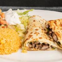 Fajita Quesadilla Supreme · Extra-Large flour tortilla grilled, folded and grilled with cheese, peppers, onions, mushroo...