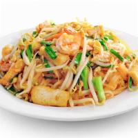 Pad Thai · Stir-fried rice noodles with egg, tofu, and protein in a house-made tamarind sauce. Topped w...