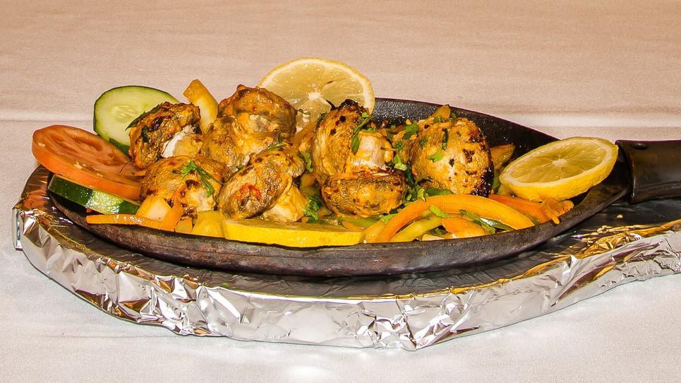 Chicken Tikka Kabob · Gluten free. Boneless chicken breast cubes marinated overnight with chefs special spice, grilled in clay oven.