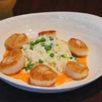 Pan Seared Sea Scallops · Available to order from 4 pm until close.. Creamed basmati rice with sweet peas and leeks, r...