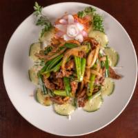 Mongolian Beef · Spicy. Sliced tender beef sautéed with onion, scallions.