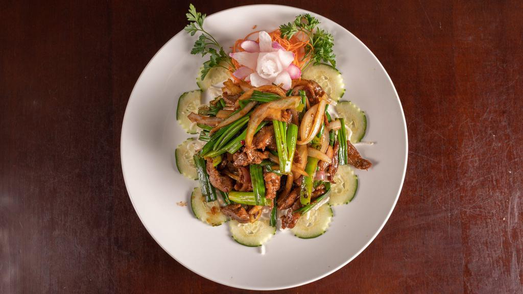 Mongolian Beef · Spicy. Sliced tender beef sautéed with onion, scallions.