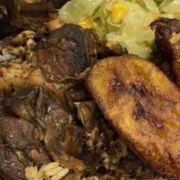 Brown Stew Fish Extra Large Fish · Served with your choice of rice and beans or white rice with cabbage.