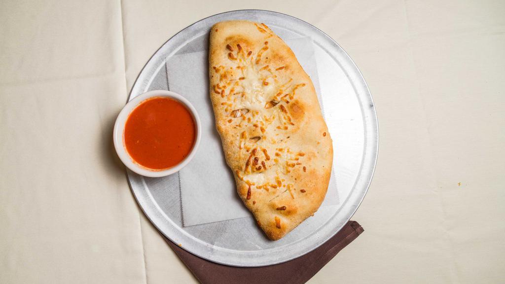 Meatball Parmigiana - Calzones · With mozzarella cheese. served with a side of marinara sauce.