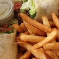 Cheesesteak Wrap · Served with American cheese. Comes with romaine lettuce, tomatoes, onion and side of French ...