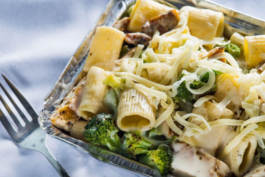 Chicken Broccoli Alfredo · Served with garlic bread and cheese.