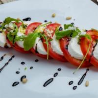 Caprese Salad · tomato mozzarella balsamic drizzle olive oil basil pesto