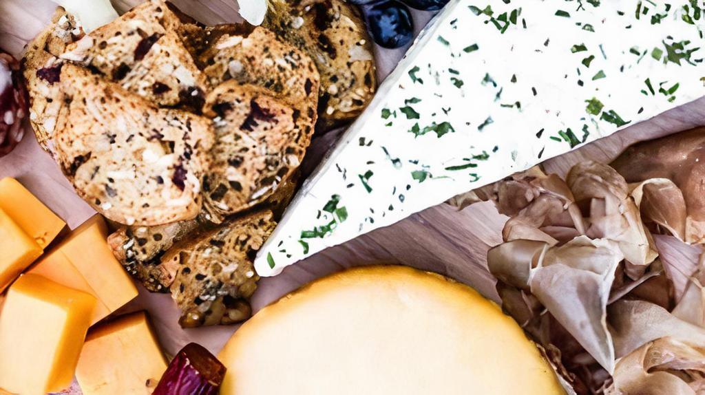Cheese Board · assorted Mediterranean cheese  fruit nuts olives chutney crackers
