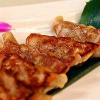 Gyoza · Fried dumplings that are premade and contains Pork.
Comes with a side of Tempura Sauce (It's...
