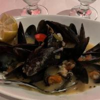 Steamed Mussels · Provencal style, leeks, tomatoes lemon and white wine.