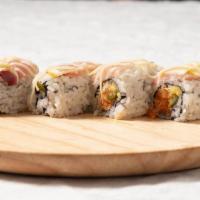 Passion Roll · Spicy salmon, mango, jalapeÃ±o, topped with yellowtail lemon.