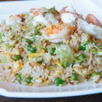Fried Rice · Wok-tossed in savory sauce with egg, peas, bean sprouts, green onion.