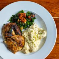 Herb Roasted Hunter'S Chicken · Half roasted chicken with mashed potato, carrot, and kale w/chicken gravy.