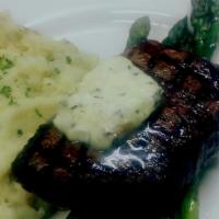 Highland Filter Mignon · With mashed potato, asparagus, and herb butter.