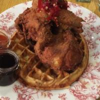 Chicken N' Waffles · Southern fried chicken over Cheddar-chive waffle, Fresno pepper maple syrup, Louisiana honey...
