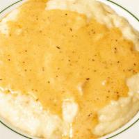 Just Grits · Southern style creamy and cheesy grits with cream sauce.