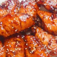 Chicken Wings With Garlic Sauce · Hot & Spicy.