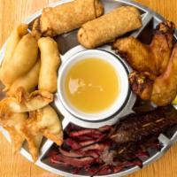 Pu-Pu Platter For 2 · Including chicken wings, beef teriyaki, boneless ribs, chicken fingers, crab rangoon, and eg...