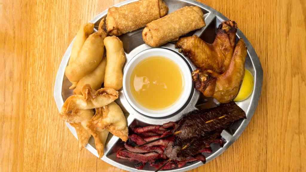 Pu-Pu Platter For 3 · Including chicken wings, beef teriyaki, boneless ribs, chicken fingers, crab rangoon, and egg rolls.