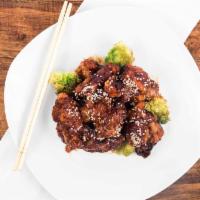 Sesame Chicken · Served with steamed rice.