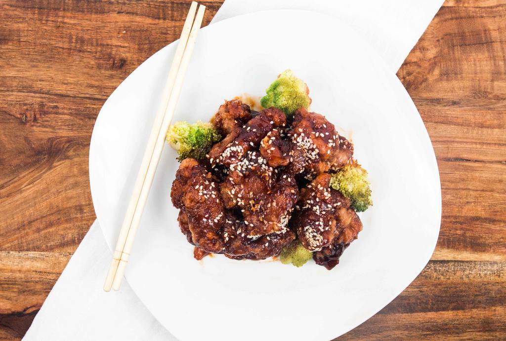 Sesame Chicken · Choice of: soup or egg roll, chicken fried rice or white rice.