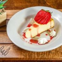 Station 1 Cheesecake · New York Style cheesecake topped with whipped cream and garnish