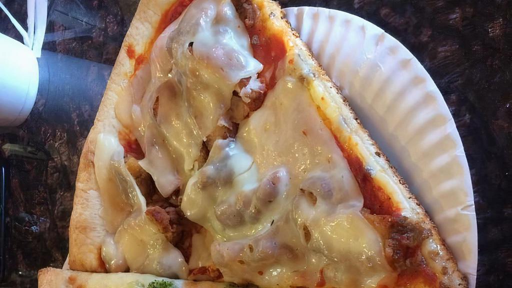 Chicken Parmigiana Pizza · Chicken cutlet, mozzarella and sauce.