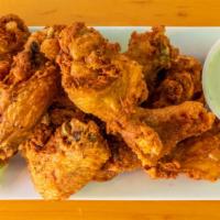 50 Wings On The Bone · Comes with up to 5 sauces or dry rubs and 5 sides of blue cheese or ranch.