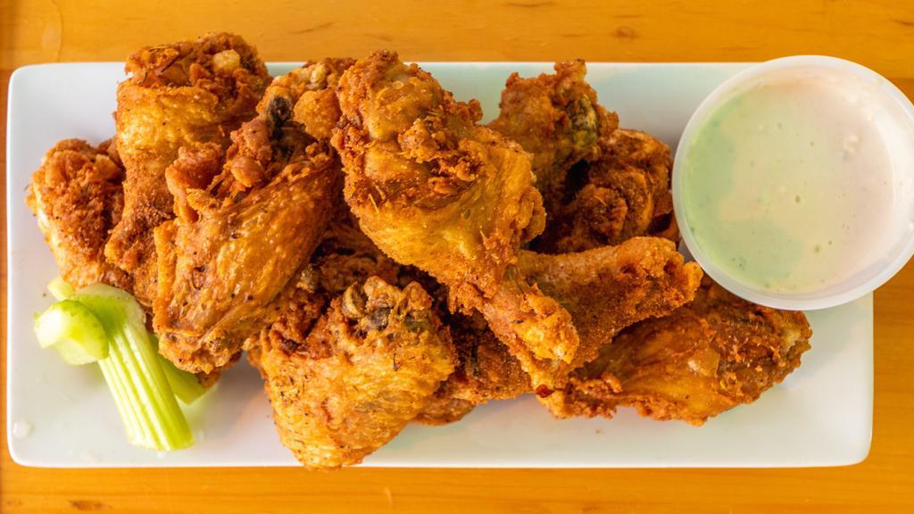 40 Wings On The Bone · Comes with up to 4 sauces or dry rubs and 4 sides of blue cheese or ranch.