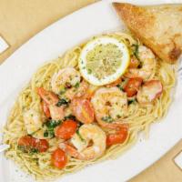 Shrimp Scampi · Shrimp in white wine sauce, butter, garlic, fresh basil and diced tomatoes. Served with ling...