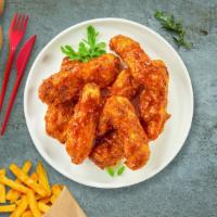 Bbq Bliss Tender · Chicken tenders breaded and fried until golden brown before being tossed in barbecue sauce.