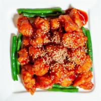 Crispy Sesame Chicken · Caramelized sweet and sour sauce.