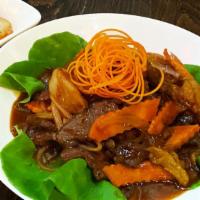 Spicy Korean Beef · Spicy. Sliced beef with eggplant, string beans, carrots, onions, and kimchi. Served with ste...