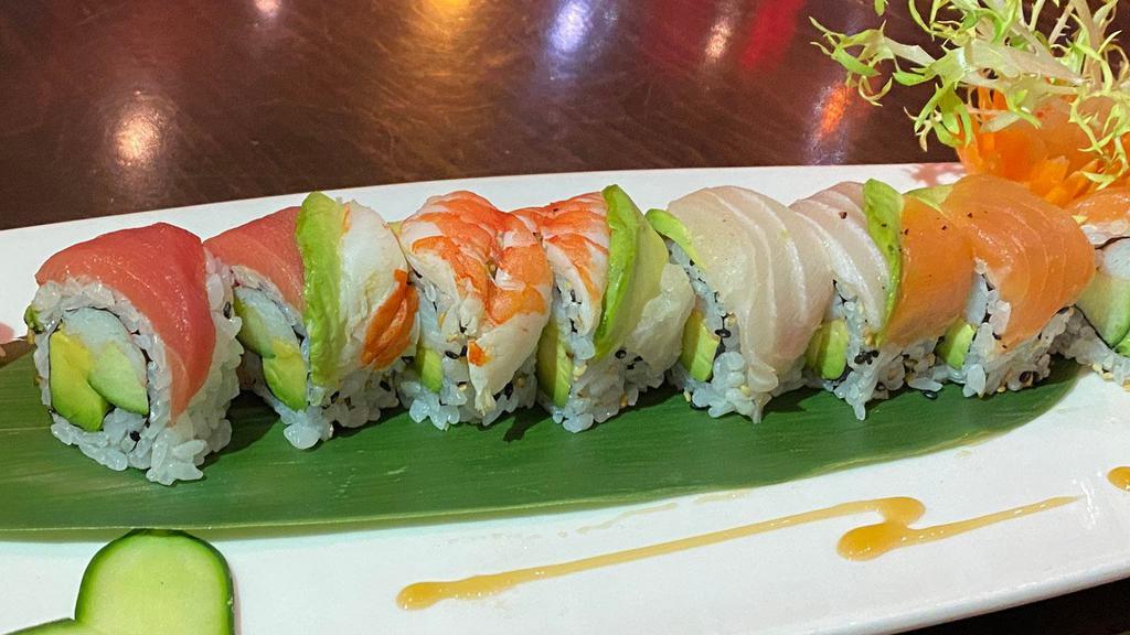 Rainbow Roll · California roll, topped with tuna, salmon, whitefish, shrimp, and avocado, and spicy cream sauce.