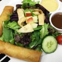 Shrimp Spring Roll Salad · Sesame-ginger dressing.