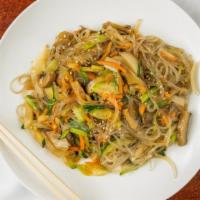 Japchae · Vermicelli noodle stir fried with beef, onion, carrot, mushroom, green onion, zuchini.
