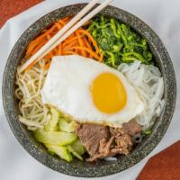 Bimbim Bap · Marinated beef or chicken or tofu, assorted seasoned bean sprout, carrot, zuchini, spinach w...