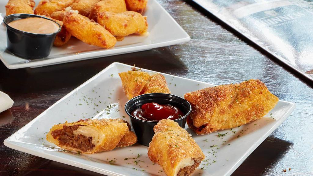 Philly Cheesesteak Rolls · Mini cheesesteak stuffed in a crispy shell.