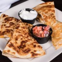 Celtic Quesadilla · A crispy grilled tortilla filled with melted cheese and fresh scallions with your choice of ...