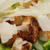Caesar Salad · Romaine lettuce, grated parmesan cheese, and croutons.