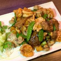 Heaven & Earth · Chicken, BBQ pork, and shrimp blended with pineapple, snow peas, and mushrooms. Served with ...