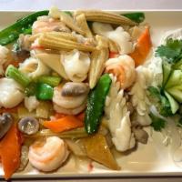 Seafood Platter · A savory combination of shrimp, squid, scallop, broccoli, and mushroom with chef's sauce. Se...