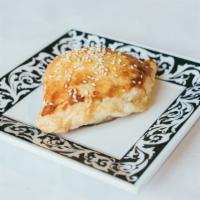 Samsa * · Oven baked flaky pastries stuffed with savory fillings with beef and onion.